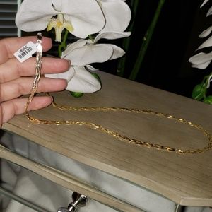 14kt gold braided herringbone chain. 22 inches